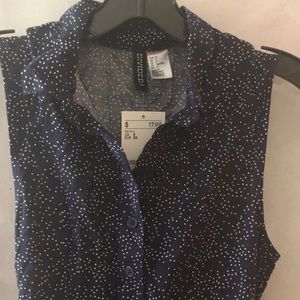 Blue and White polka dot sleeveless dress.